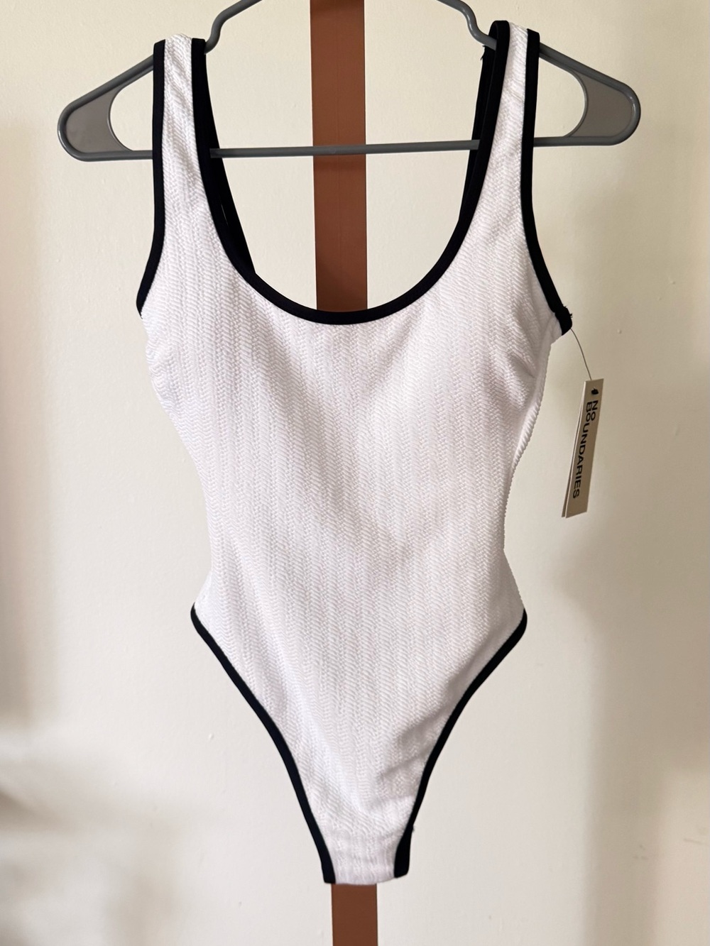 No Boundaries White One-Piece Swimsuit with Black Trim Accents